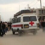 Véhicule de la Croix-Rouge à Gaza avec des otages libérés.