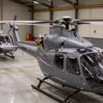 Flotte d'hélicoptères Airbus H145M en hangar.